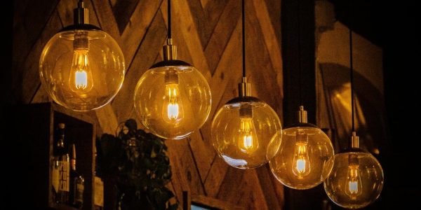 row-of-decorative-light-bulbs-hanging-in-a-cafe_181624-58119